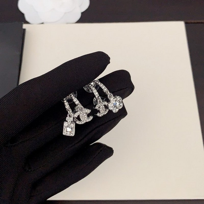 Chanel Flower Diamond Earrings - 18K White Gold
