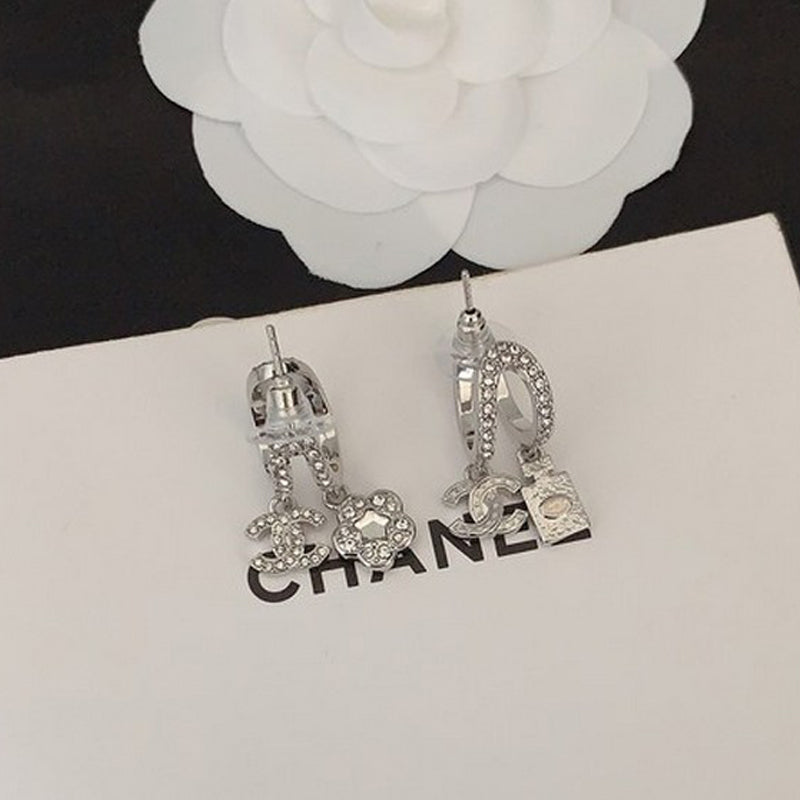Chanel Flower Diamond Earrings - 18K White Gold