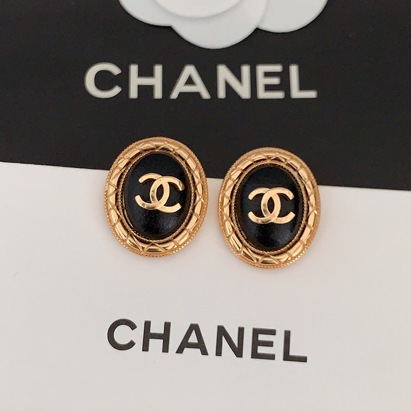 Chanel Oval Leather Earrings - 18K Yellow Gold