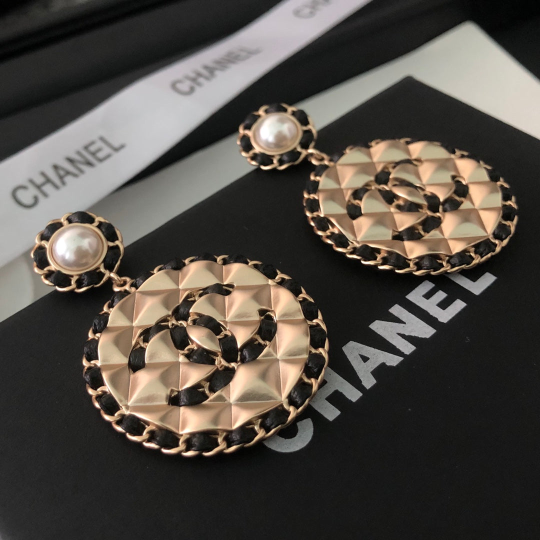 Chanel Leather Round Earrings - 18K Yellow Gold