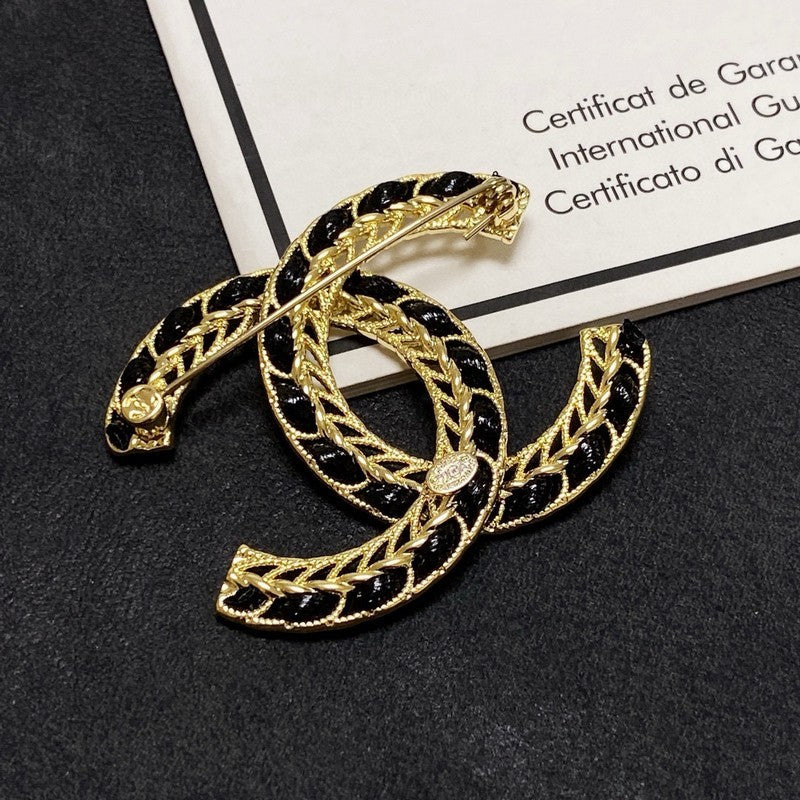 Chanel Leather Gold Brooch